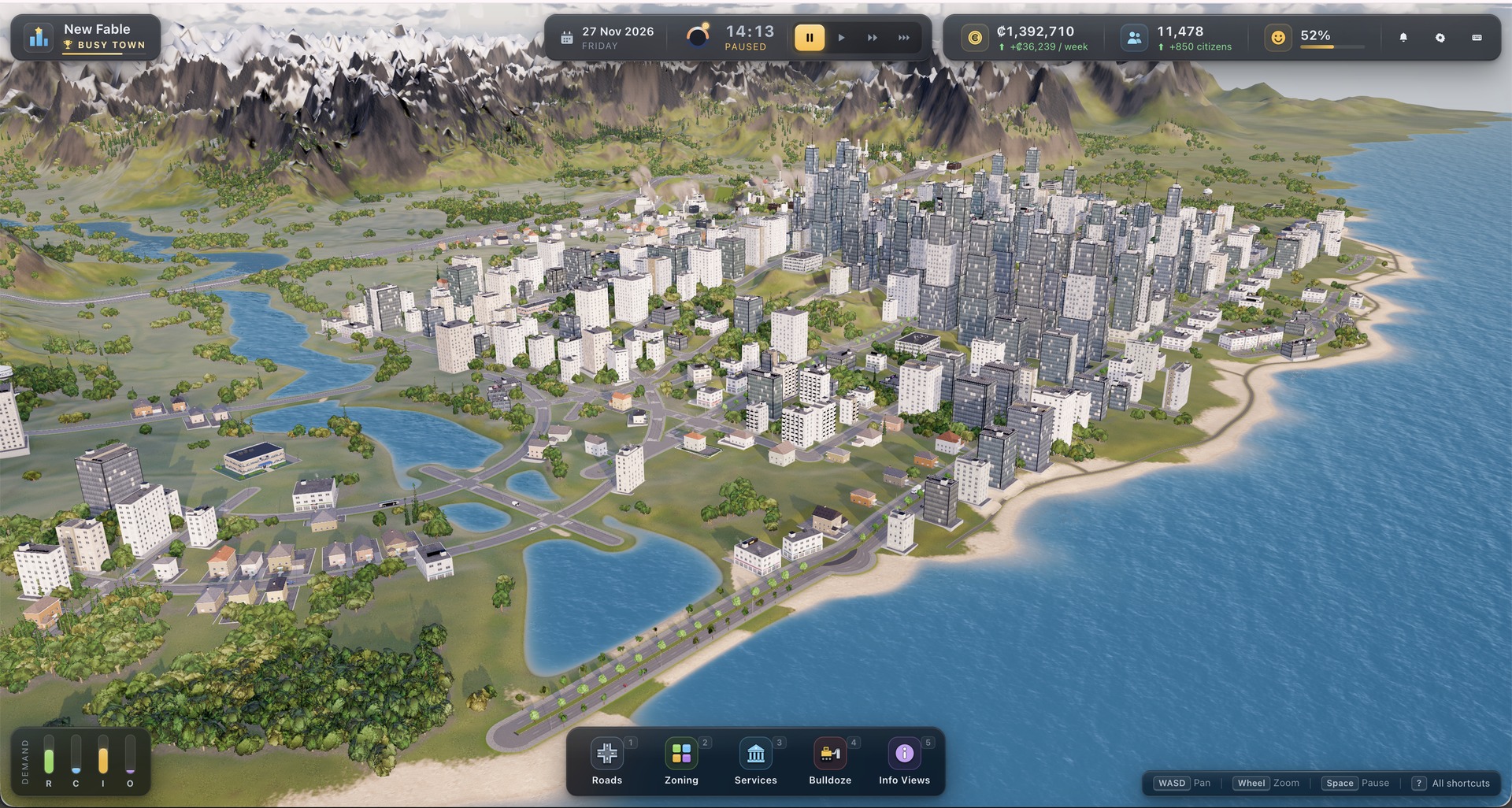 Fable Cities: an aerial view of a generated city on a coastline